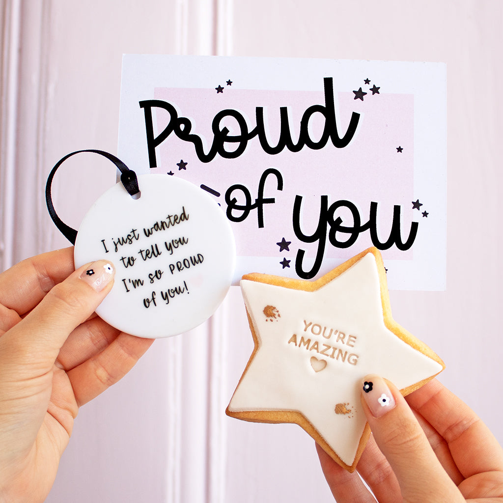 Proud of you postcard with a star biscuit printed with the words you're amazing and a ceramic keepsake that says I just wanted to tell you I'm so proud of you.