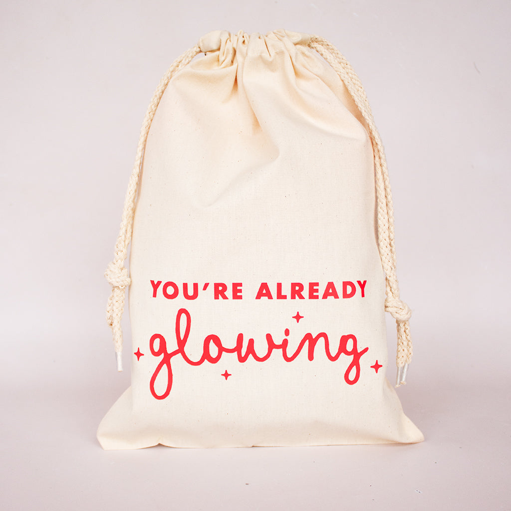 You're Already Glowing Drawstring Bag