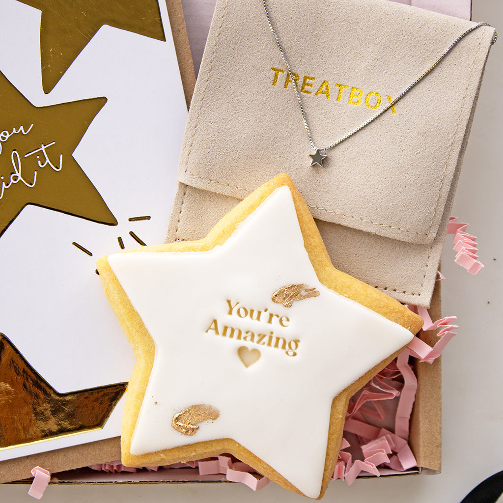 Star-shaped biscuit with 'You're Amazing' text, silver plated star necklace